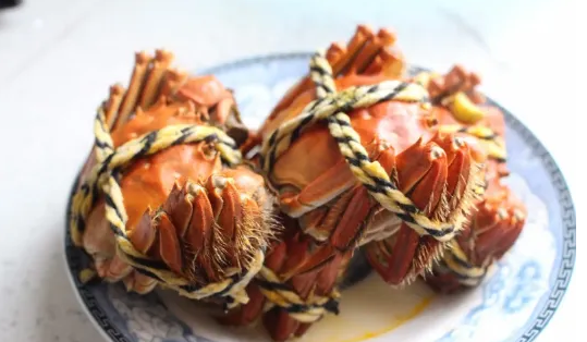 熟螃蟹在锅里保温一晚上还能吃吗2